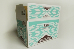 Basic Mottle White RSC Shipper in 2 color featuring bar code, diecut hand holes, and PMS inks.
